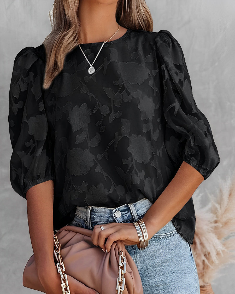 Elegante Bluse mit Puffärmeln und Blumenmuster