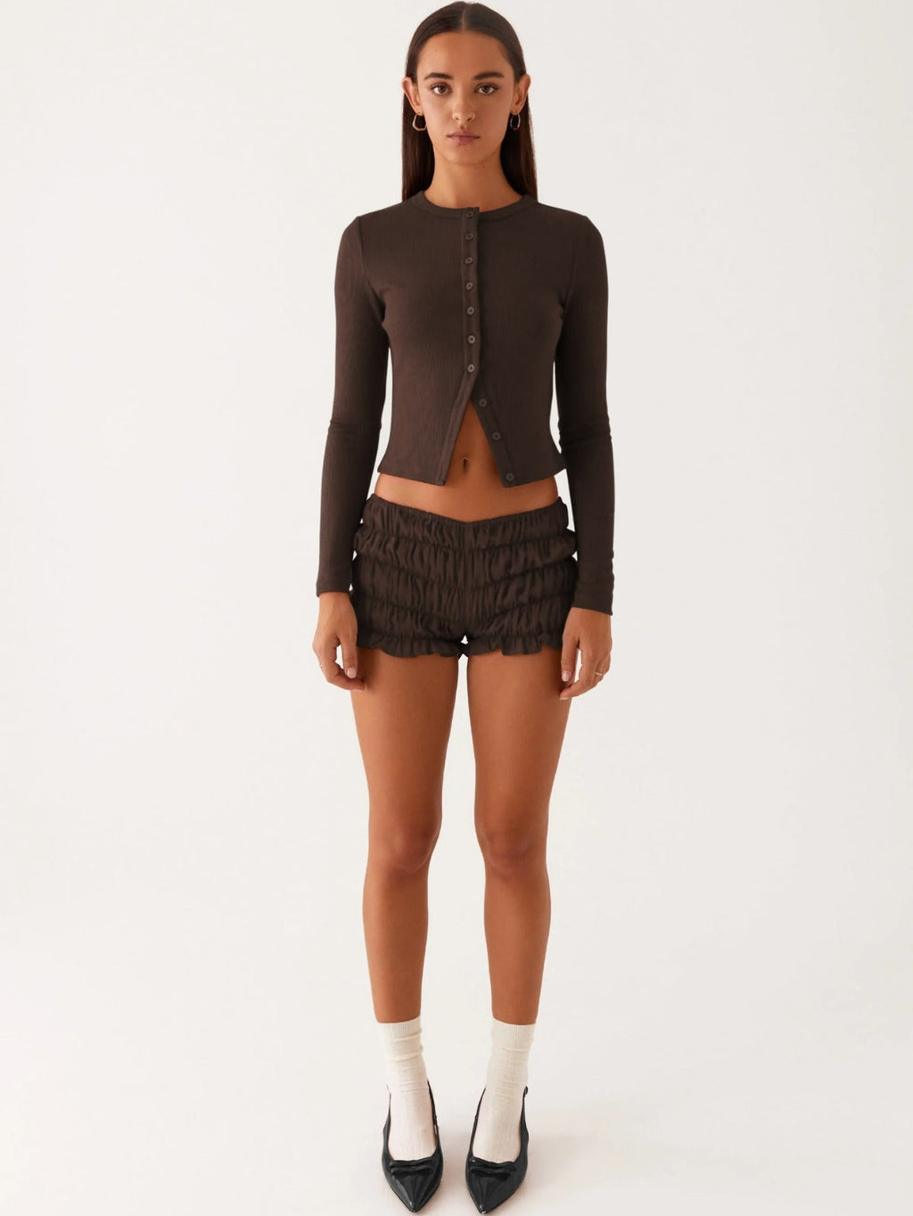 Einfarbige schmal geschnittene lange Strickjacke