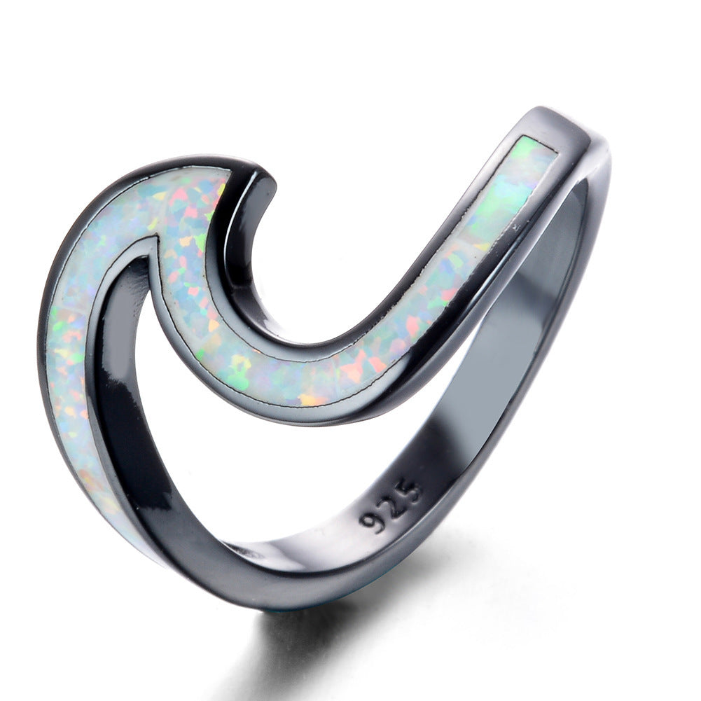 Damen Ring mit modernem Wellenmuster aus opalisierendem Stein Shop Nory