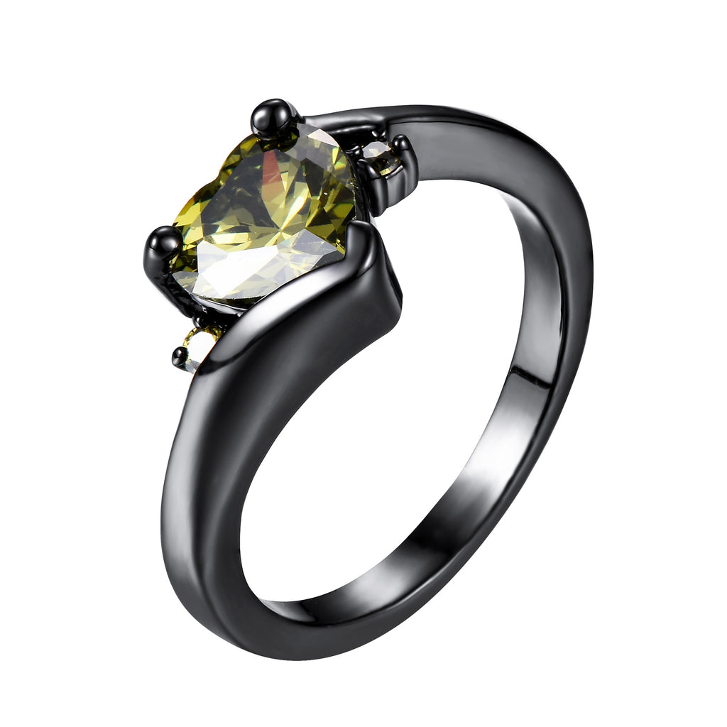Damen Ring mit herzförmigem blauen Zirkonstein und eleganter schwarzer Fassung Shop Nory