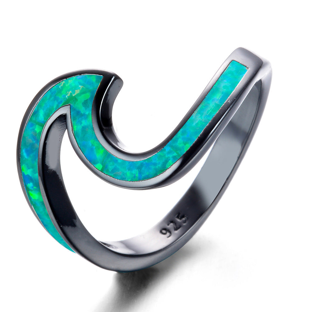 Damen Ring mit modernem Wellenmuster aus opalisierendem Stein Shop Nory