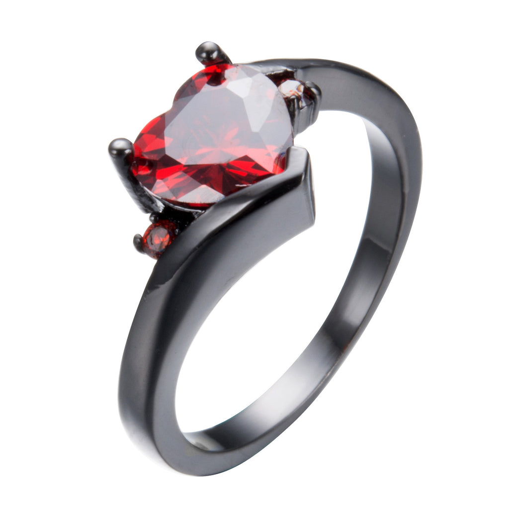 Damen Ring mit herzförmigem blauen Zirkonstein und eleganter schwarzer Fassung Shop Nory