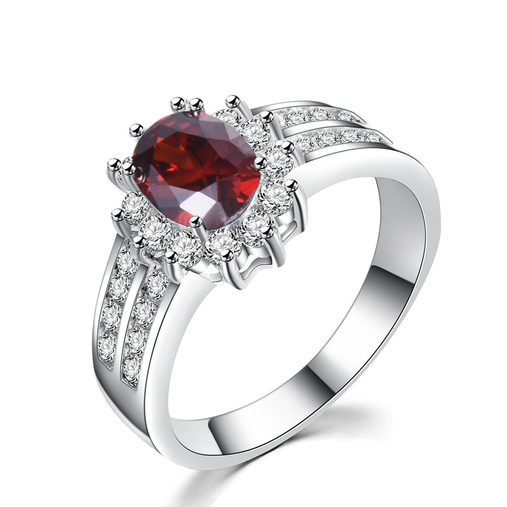 Damen Ring mit funkelndem grünem Edelstein und exquisiten Zirkonia-Verzierungen Shop Nory