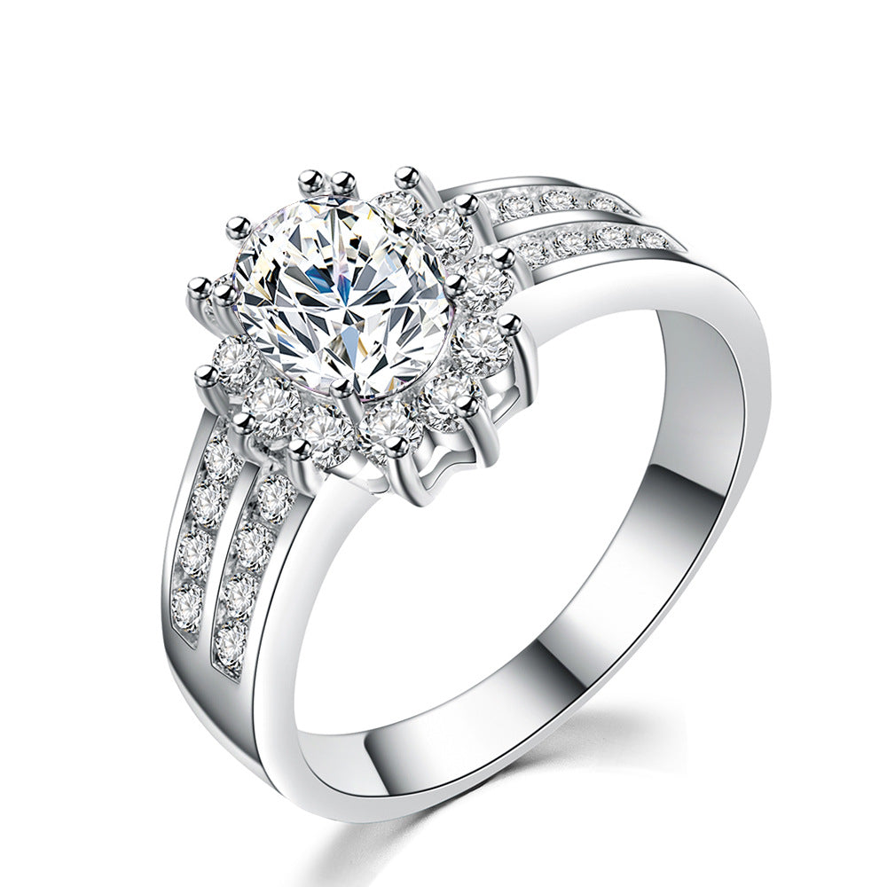 Damen Ring mit funkelndem grünem Edelstein und exquisiten Zirkonia-Verzierungen Shop Nory