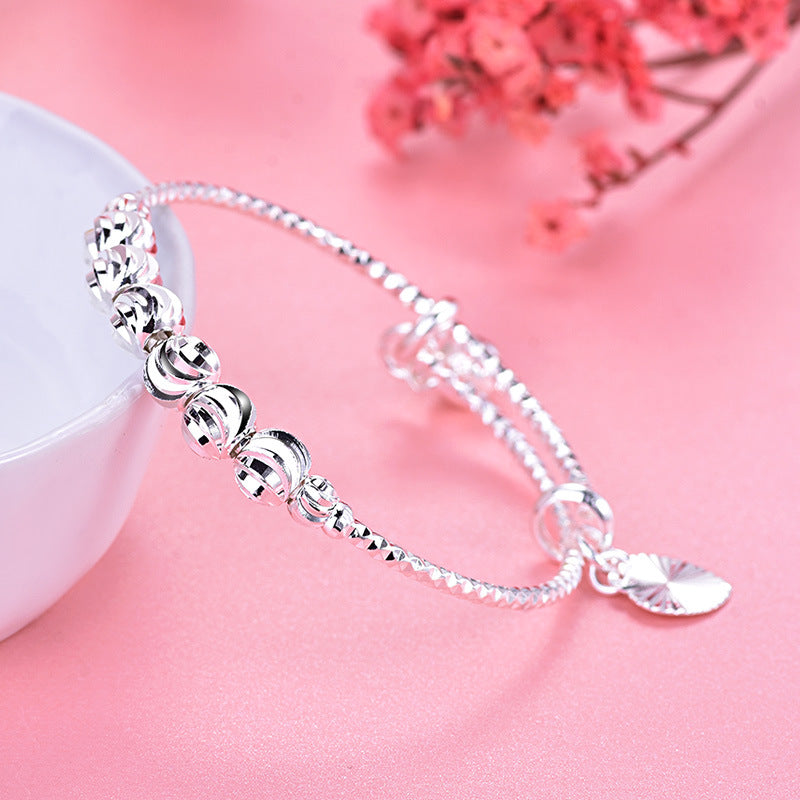 Damen Eleganter Armreif mit kunstvoll gestalteten Perlen Shop Nory