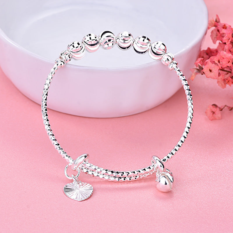 Damen Eleganter Armreif mit kunstvoll gestalteten Perlen Shop Nory