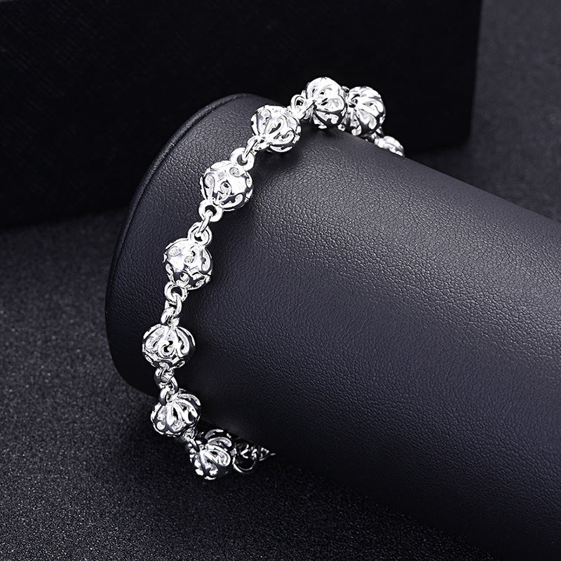 Damenarmband aus hochwertigem Sterling Silber mit kunstvollen Reliefdetails Shop Nory