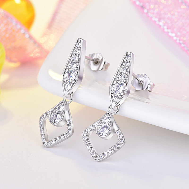 Damen Funkelnde Ohrringe mit elegantem, geometrischem Design Shop Nory