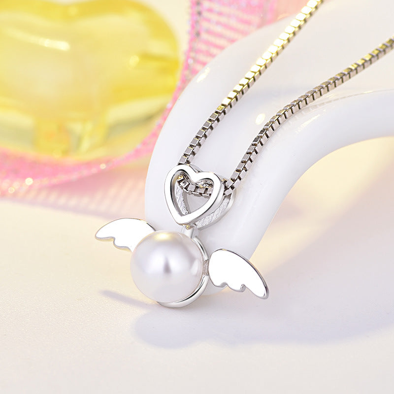 Damen-Halskette mit Herz- und Flügel-Design aus hochwertigem Edelstahl Shop Nory