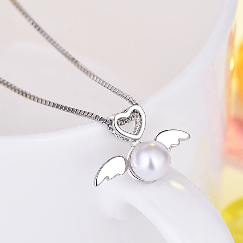 Damen-Halskette mit Herz- und Flügel-Design aus hochwertigem Edelstahl Shop Nory