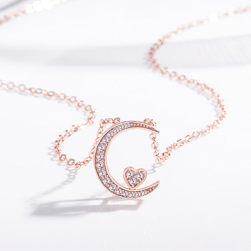 Damen Halskette mit elegantem Halbmond-Anhänger und funkelnden Zirkonia Shop Nory