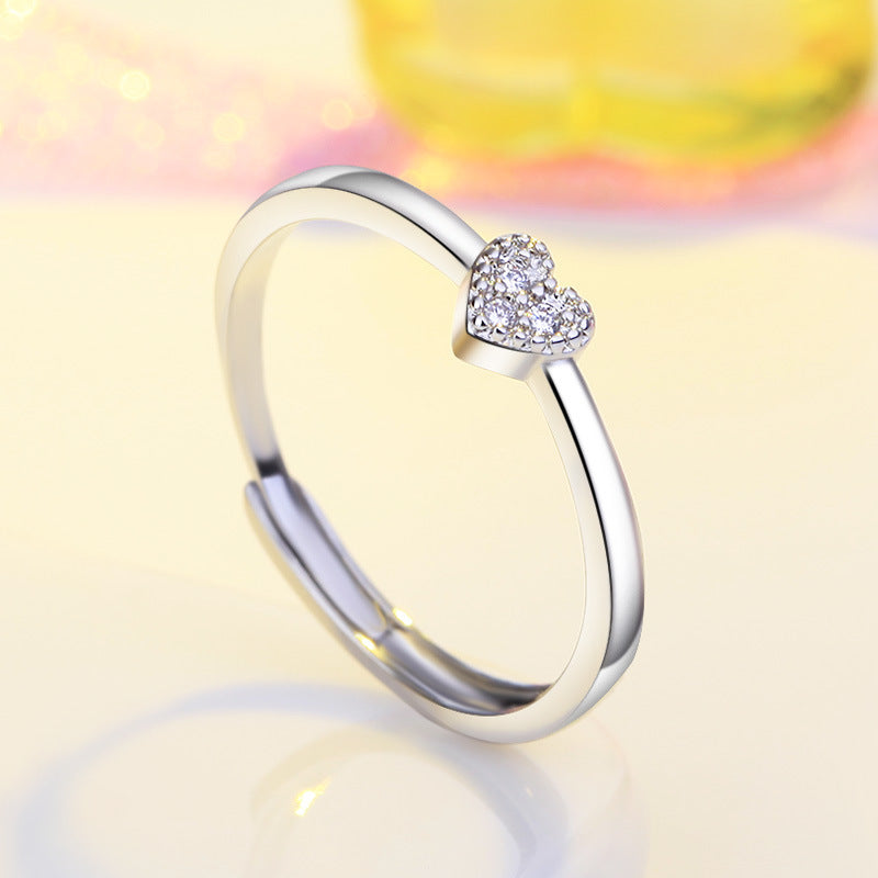 Damenring mit filigranem Herzdesign und funkelnden Zirkonia Shop Nory