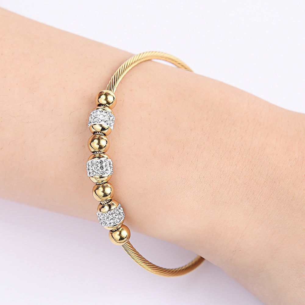 Damen Armband mit funkelnden Kristall- und Metallakzenten Shop Nory