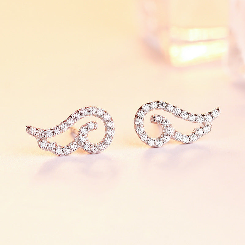 Damen Ohrringe im eleganten Spiraldesign mit funkelnden Zirkonia Shop Nory