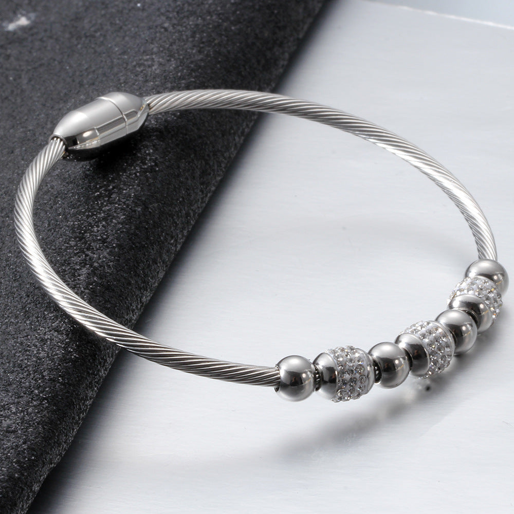 Damen Armband mit funkelnden Kristall- und Metallakzenten Shop Nory