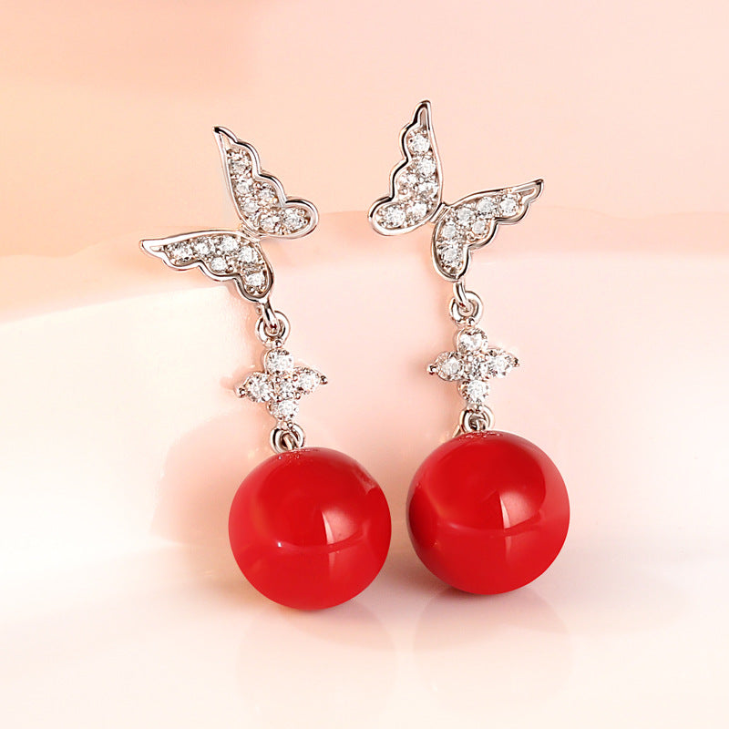 Damenohrringe mit Schmetterlingsdesign und funkelnden Zirkonia Shop Nory