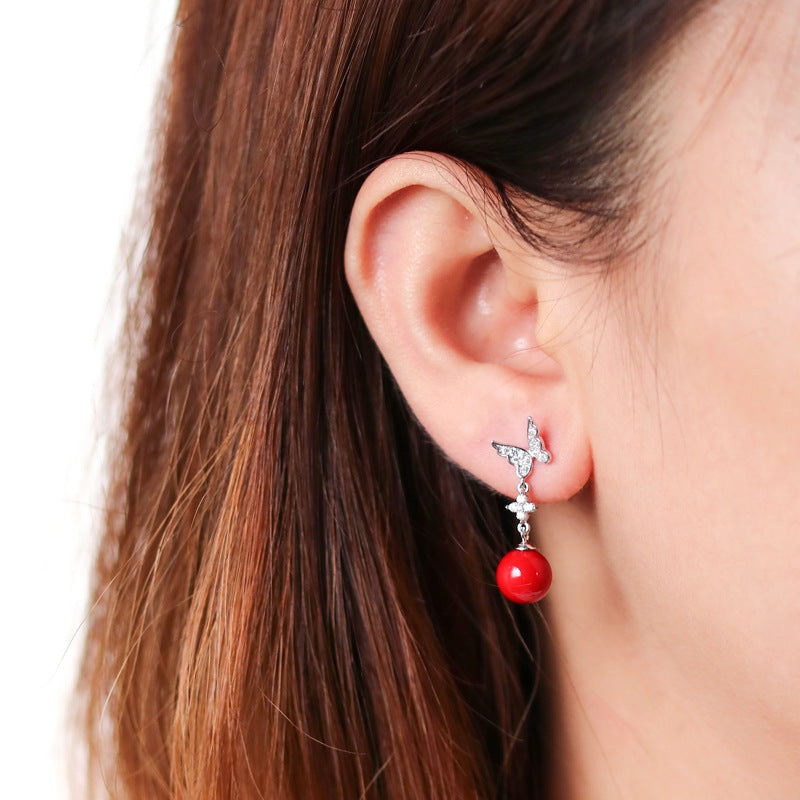 Damenohrringe mit Schmetterlingsdesign und funkelnden Zirkonia Shop Nory