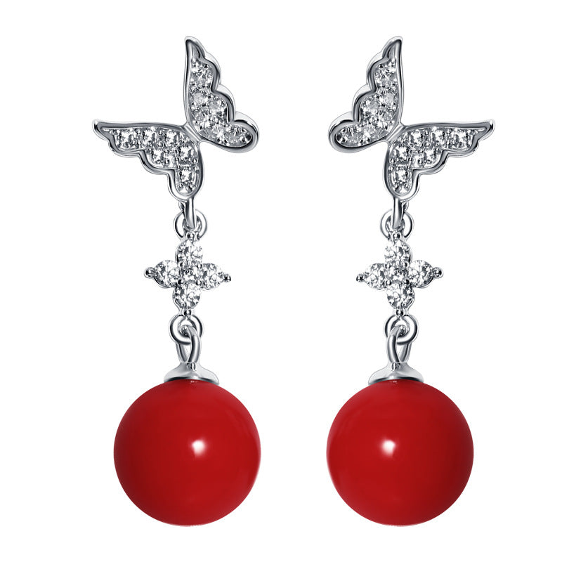 Damenohrringe mit Schmetterlingsdesign und funkelnden Zirkonia Shop Nory