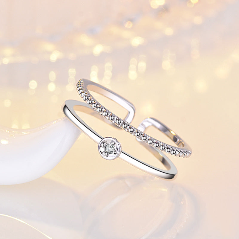 Damen Offener Ring mit elegantem Zirkonia-Besatz und modernem Design Shop Nory