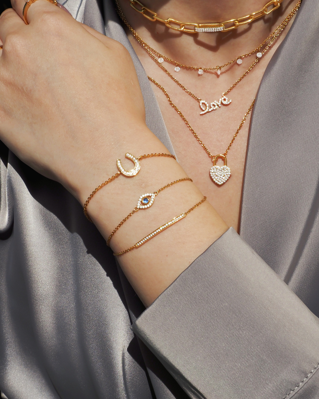 Glückliches böse Auge Kristall Gold Charm-Armband | Shop Nory