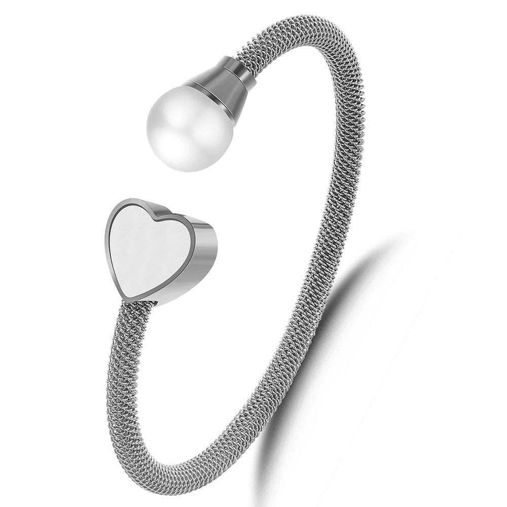 Damen Armreif mit Herzdesign und elegantem Perlenakzent Shop Nory