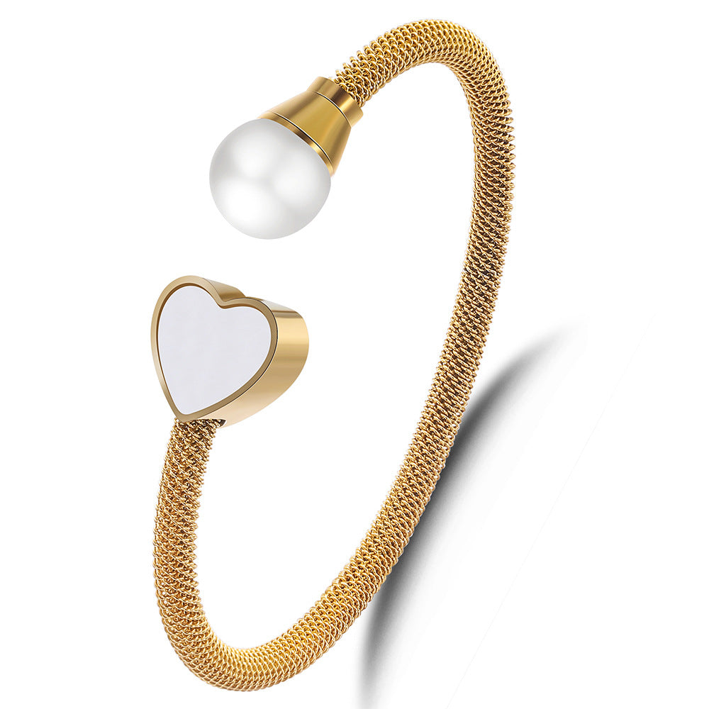 Damen Armreif mit Herzdesign und elegantem Perlenakzent Shop Nory
