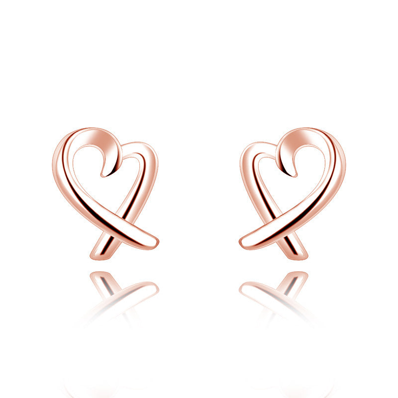 Damen Ohrstecker im herzförmigen Design mit elegantem Zirkonia-Besatz Shop Nory