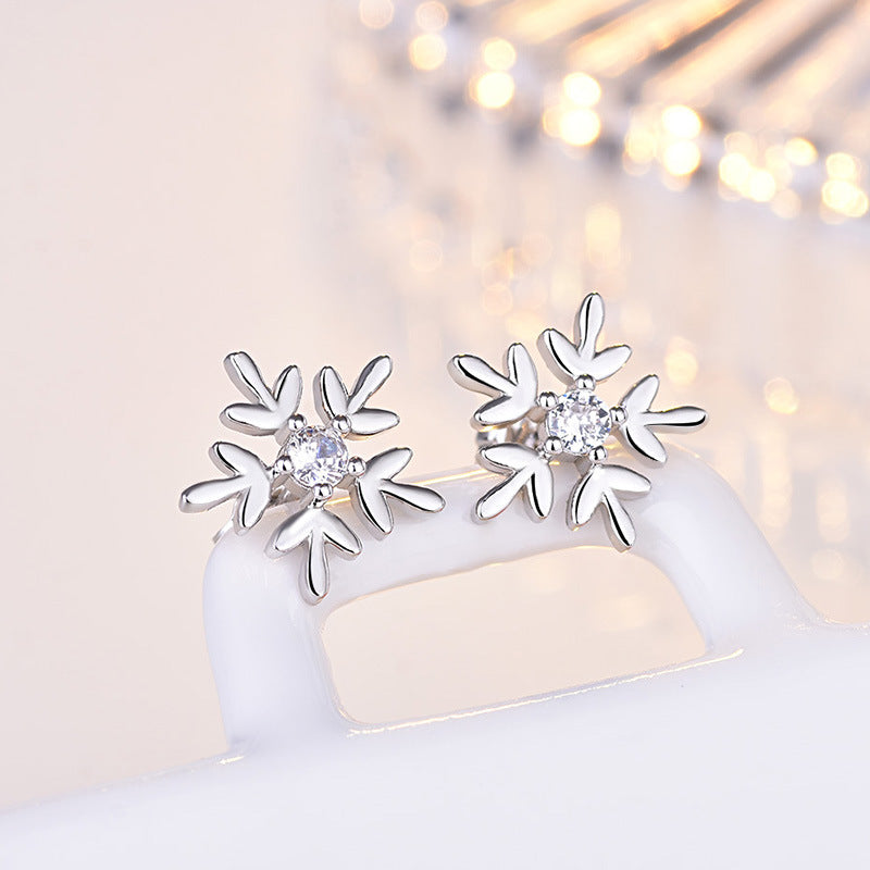 Damen-Ohrstecker mit filigranem Schneeflocken-Design und funkelndem Zirkonia Shop Nory