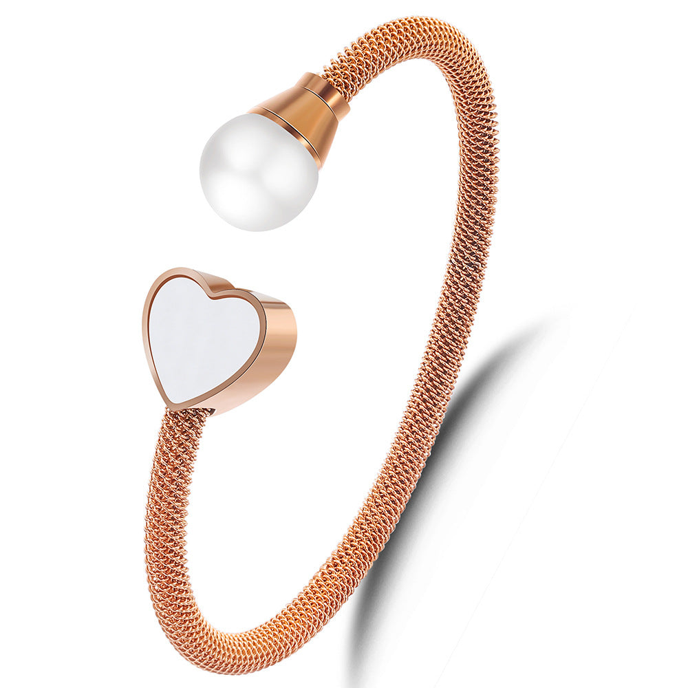 Damen Armreif mit Herzdesign und elegantem Perlenakzent Shop Nory