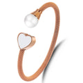 Damen Armreif mit Herzdesign und elegantem Perlenakzent Shop Nory