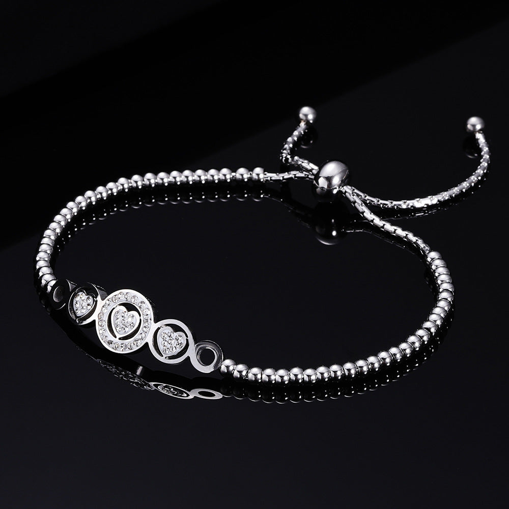 Damen Armband mit funkelndem Herzdesign und verstellbarem Verschluss Shop Nory