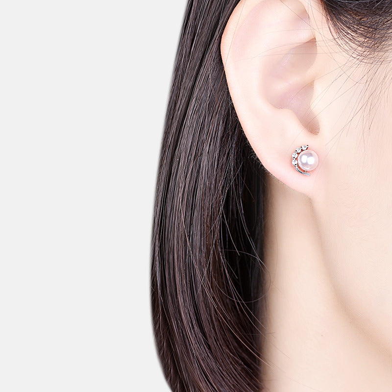 Damen Ohrringe mit eleganter Perle und funkelndem Zirkonia-Besatz Shop Nory