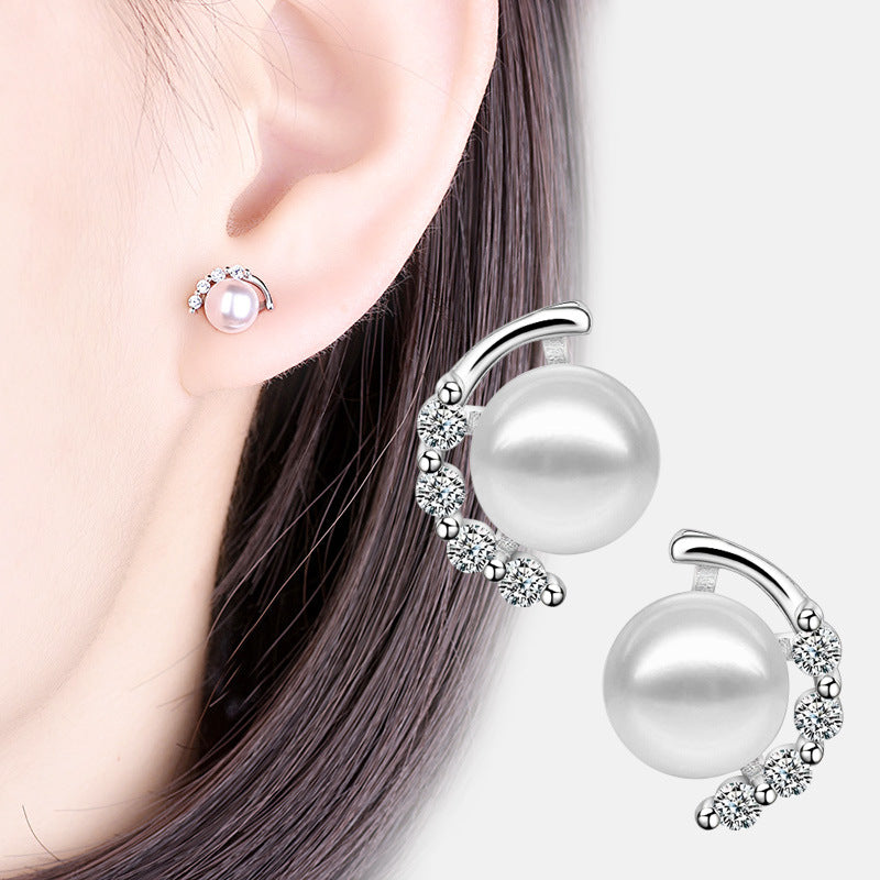 Damen Ohrringe mit eleganter Perle und funkelndem Zirkonia-Besatz Shop Nory