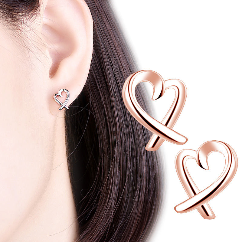 Damen Ohrstecker im herzförmigen Design mit elegantem Zirkonia-Besatz Shop Nory