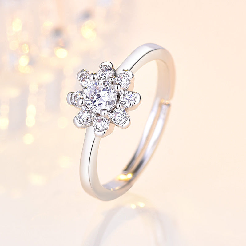 Damen Ring mit floralem Design und funkelndem Zirkonia-Besatz Shop Nory