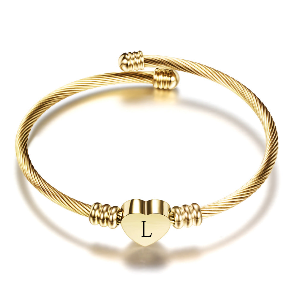 Damen Armband aus Edelstahl mit herzförmigem Anhänger und personalisierbarem Initial Shop Nory