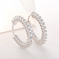 Damen Creolen mit funkelnden Zirkonia und filigranem Design Shop Nory