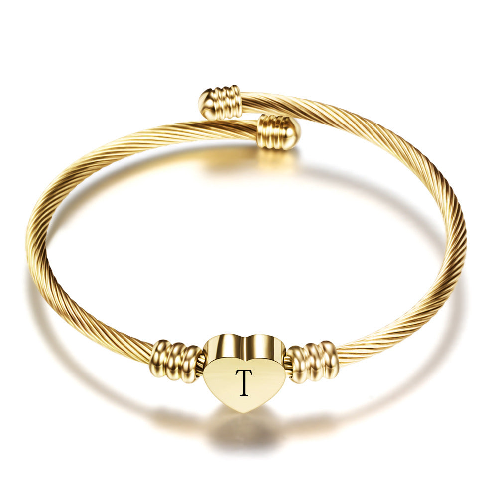Damen Armband aus Edelstahl mit herzförmigem Anhänger und personalisierbarem Initial Shop Nory