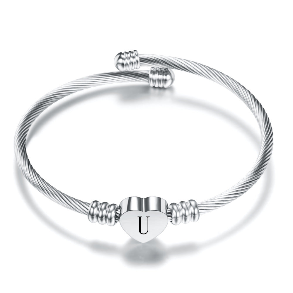 Damen Armband aus Edelstahl mit herzförmigem Anhänger und personalisierbarem Initial Shop Nory