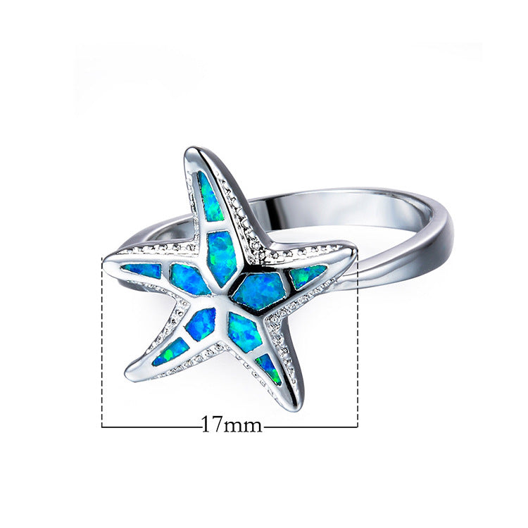 Damen Ring mit kunstvollem See-Stern-Design und schimmernden Opal-Elementen Shop Nory