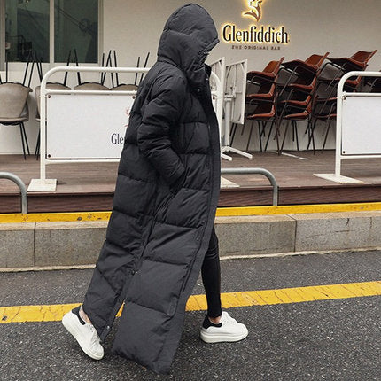 Damen Maximal langer Steppmantel mit Kapuze, winddichter Thermofüllung und seitlichen Reißverschlüssen Shop Nory