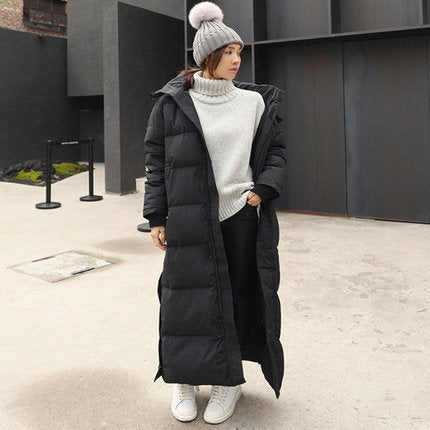 Damen Maximal langer Steppmantel mit Kapuze, winddichter Thermofüllung und seitlichen Reißverschlüssen Shop Nory