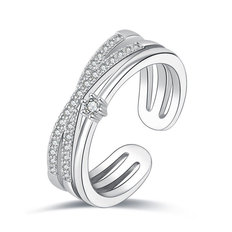 Damen Offener Ring mit funkelnden Zirkonia-Elementen und kunstvollem Design Shop Nory
