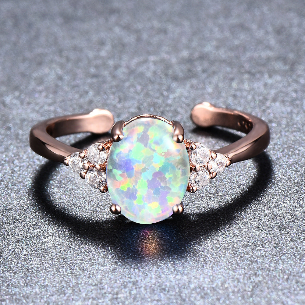 Damen Ring mit schimmerndem Opal und funkelnden Zirkonia-Details Shop Nory