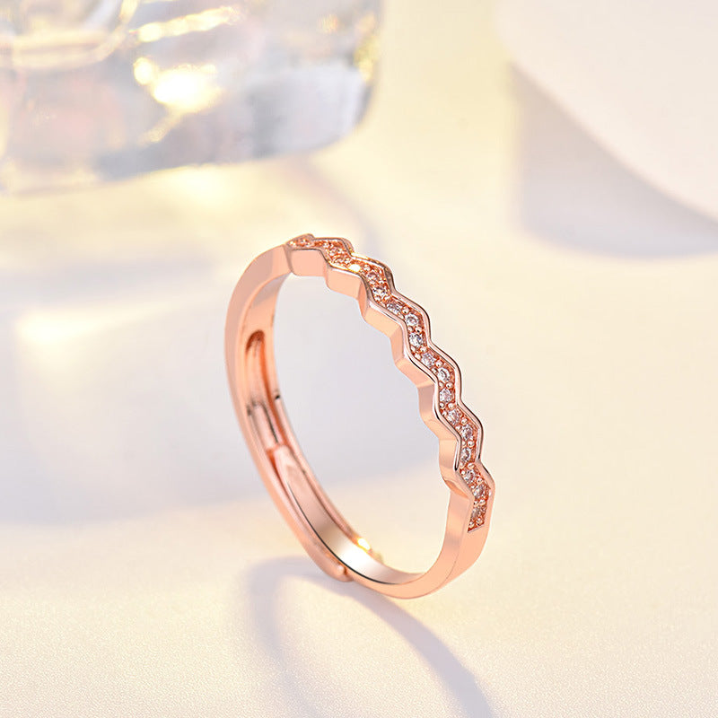 Damen eleganter Zickzack-Ring mit funkelnden Zirkonia-Elementen Shop Nory
