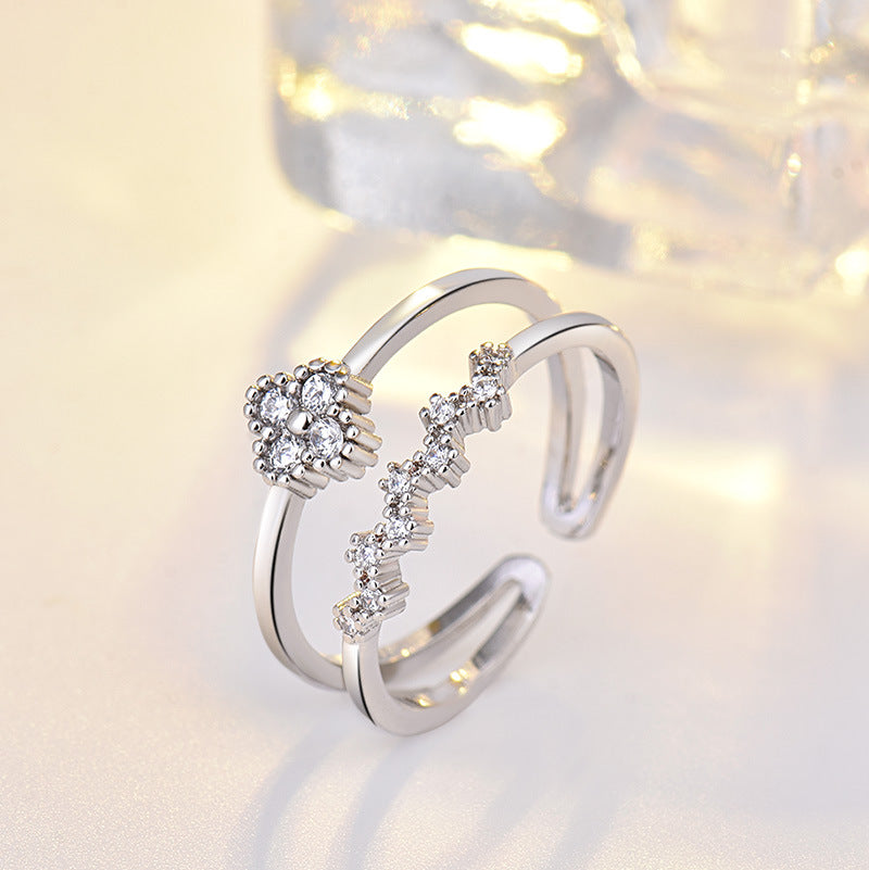 Damen Offener Ring mit floralem Design und funkelnden Zirkonia Shop Nory