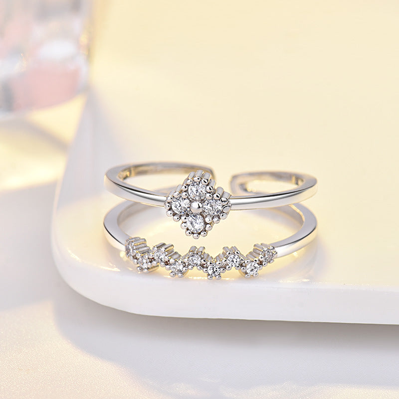 Damen Offener Ring mit floralem Design und funkelnden Zirkonia Shop Nory