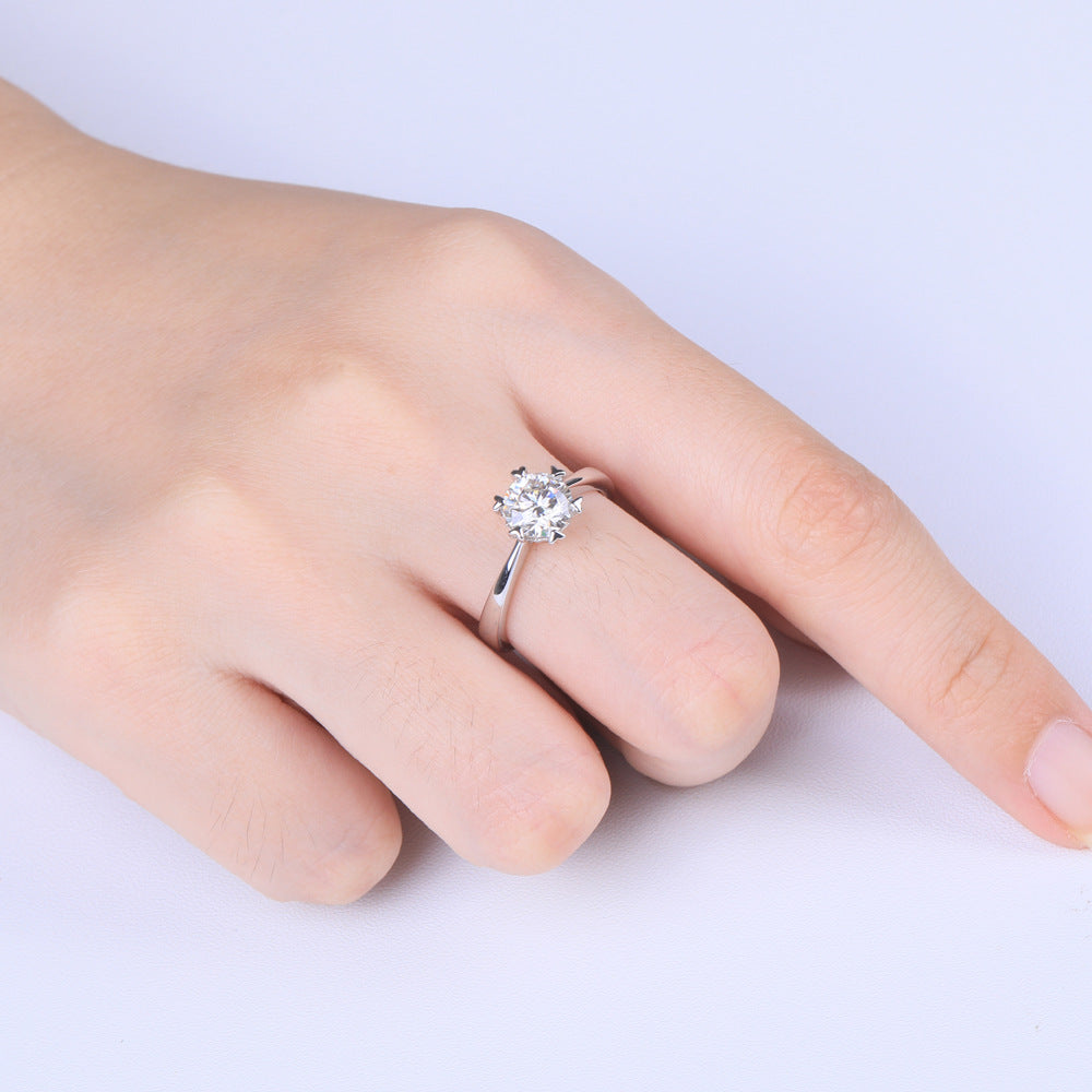 Damen Ring mit funkelndem Hauptstein und romantischem Herzdesign Shop Nory
