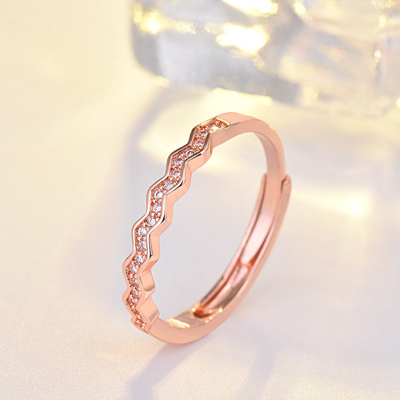 Damen eleganter Zickzack-Ring mit funkelnden Zirkonia-Elementen Shop Nory