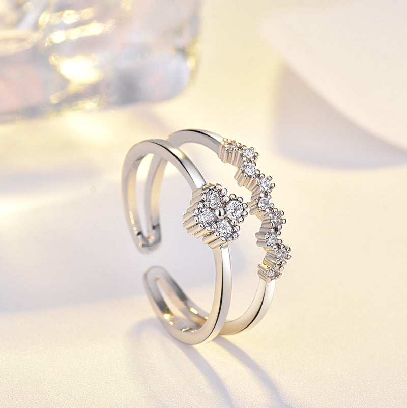Damen Offener Ring mit floralem Design und funkelnden Zirkonia Shop Nory